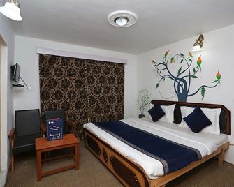 Oyo 9083 Hotel New Tourist Palace - Pahalgam - Спальня