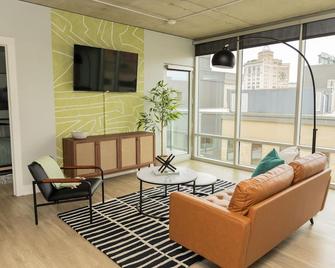 Private Balcony Abstract Apt Dwtn GR w/parking and King Bed - Grand Rapids - Living room