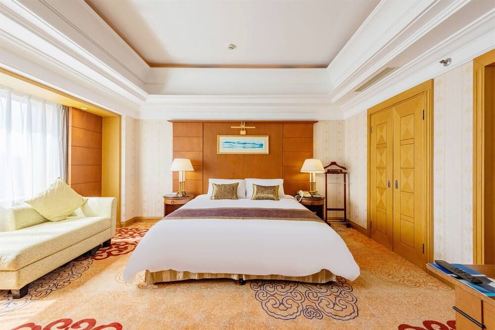 Ruishi Hotel Dalian - דאליין - חדר שינה