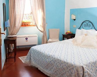 Albergo Duomo - מונטפולצ'אנו - חדר שינה