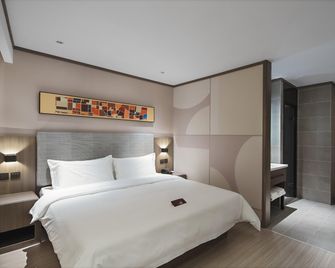 Hanting Hotel Nanjing Pukou University of Information Technology Metro Station - Nanchino - Camera da letto