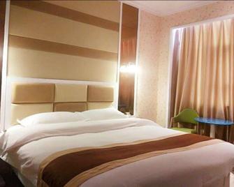 Jiutian Holiday Hotel - Mianyang - Bedroom