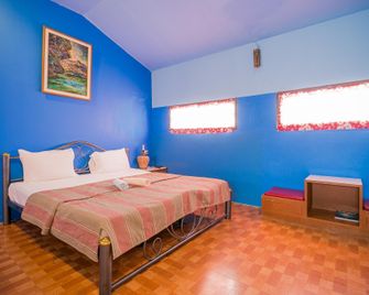 Thalang Guesthouse - Phuket - Camera da letto