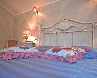 La Petite Maison - Viareggio - Schlafzimmer
