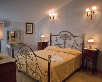 La Petite Maison - Viareggio - Phòng ngủ