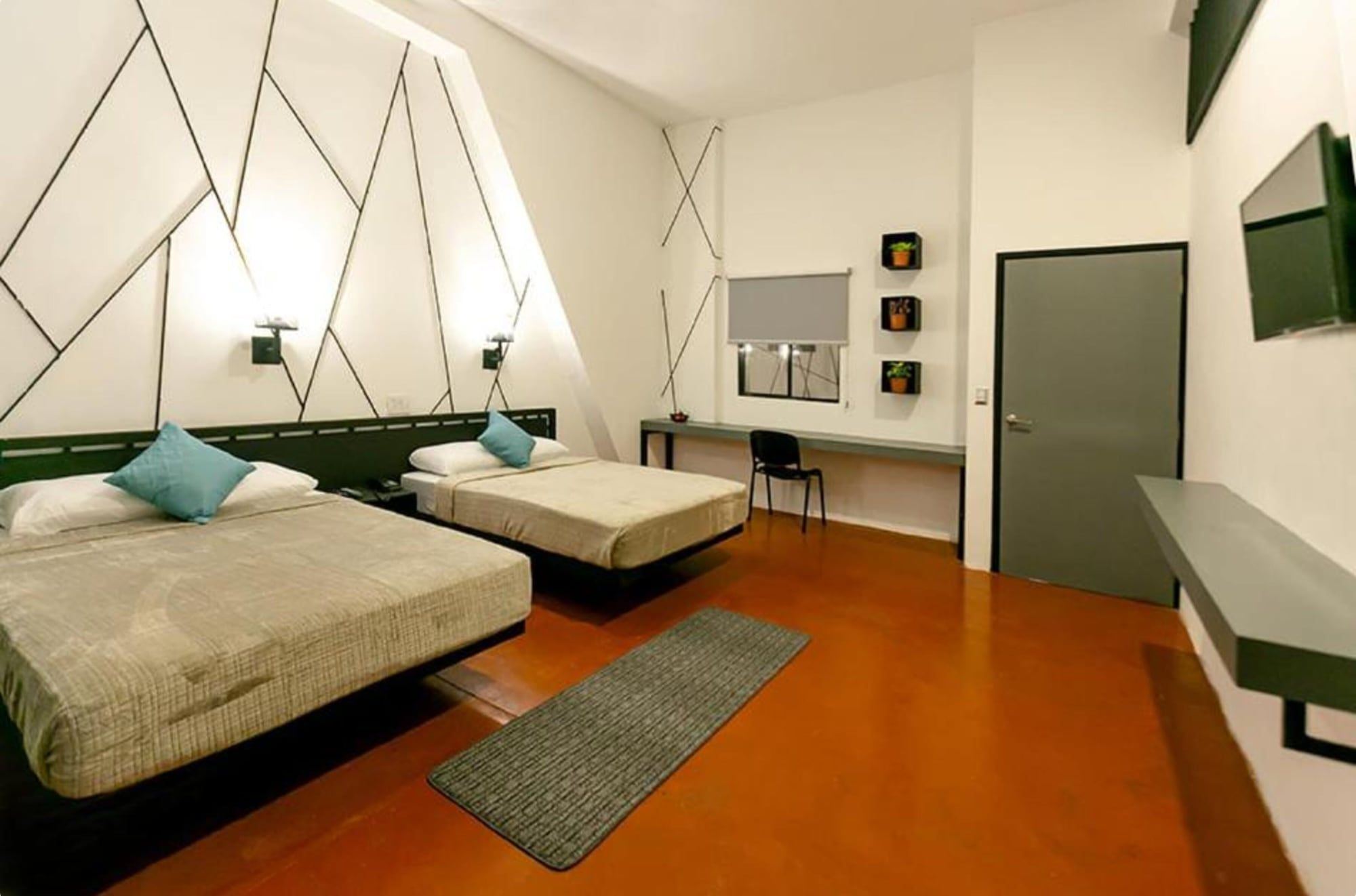 D la Torre Hotel - מנגואה - חדר שינה