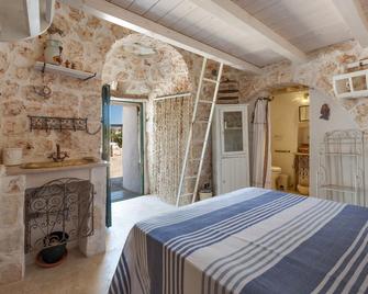 Relais Patriarca - Ostuni - Schlafzimmer