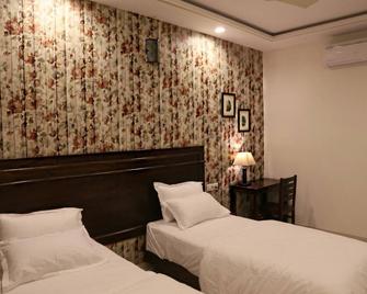 White Tulips Home Stay - Τζαϊπούρ - Κρεβατοκάμαρα