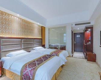 Garden Hotel - Jiangmen - Schlafzimmer