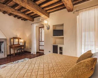 Relais La Fattoria - Passignano sul Trasimeno - Bedroom