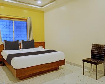 Collection O Blue Ridge Guest House - Pune - Bedroom