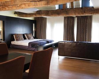 Hotel Van Eyck - Маасейк - Спальня