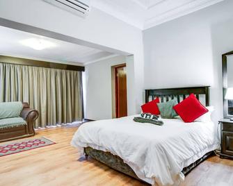 The Nightingale Guesthouse - Bloemfontein - Yatak Odası