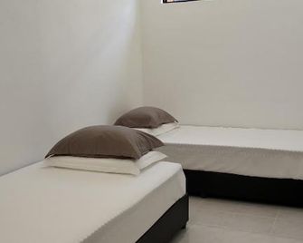 Mersing little homestay with free WIFI - Mersing - Ložnice