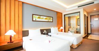 Muong Thanh Luxury Nhat Le Hotel - Dong Hoi - Schlafzimmer