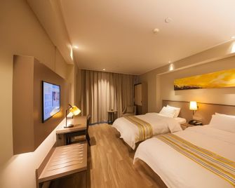 Ease Hotel Harbin Hexing Road University of Chinese Medicine - Harbin - Bedroom
