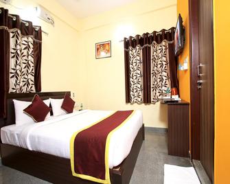 Tranzotel Redkey Inn Near Bangalore Airport - Devanhalli - Bedroom