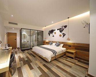 Jianwai Boutique Hostel (Haikou Qilou Old Street) - Haikou - Bedroom