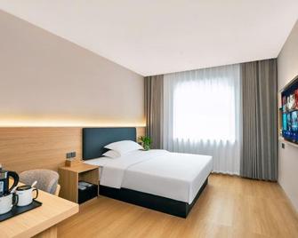 Bamboo House Hotel Cbd Branch - Suining - Ložnice