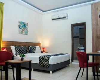 Bluebay Hôtel Abidjan - Abidjan - Slaapkamer