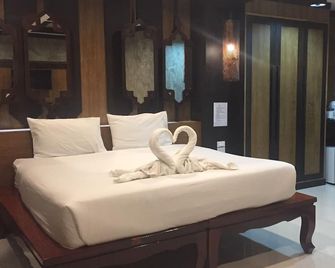 بانجالو جى جى آند جيست هاوس - جزر في في - غرفة نوم