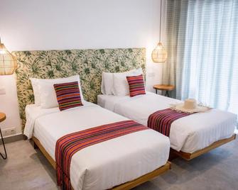 Abdi Hotel - Pemenang - Slaapkamer