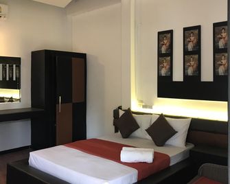 River Nature Hotel - Surat Thani - Slaapkamer