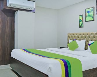 Treebo Raj Inn Lalpur - Ranchi - Schlafzimmer
