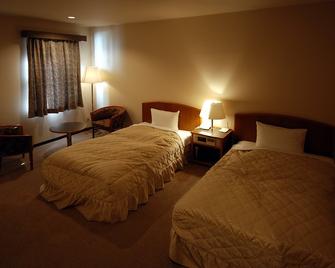 Taku City Hotel Matsuya - Saga - Schlafzimmer