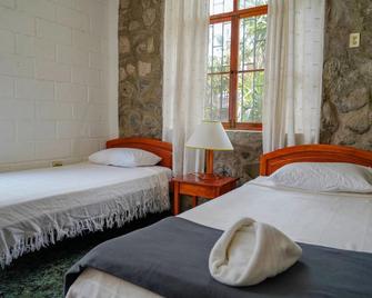Hostal Pimampiro - Puerto Baquerizo Moreno - Chambre