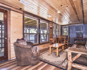 Remodeled lakeside resort cabin with fireplace, sandy beach, dock, firepit! - Saint Germain - Living room