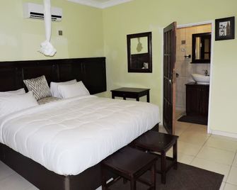 Cafe Zambezi House Of Africa - Livingstone - Schlafzimmer