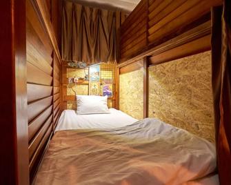 Okinawa Guest House Grand Naha - Naha - Makuuhuone