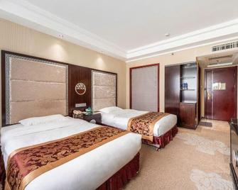 Guanli Hotel - Jiayuguan - Bedroom