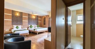 Treebo Trend Ess Grande - Coimbatore - Phòng ngủ