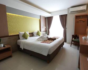 Loji Hotel - Surakarta City - Bedroom