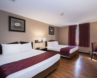 Guest Inn & Suites - Midtown Medical Center - ליטל רוק - חדר שינה