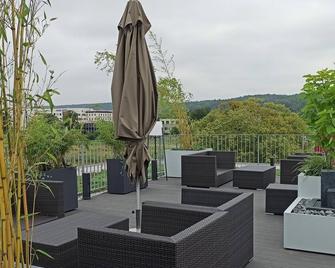 Family room with private bathroom / 1 double bed (electrically adjustable beds) + 1 pull-out single bed - Hildesheim