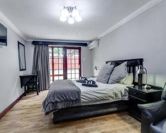 The Nightingale Guesthouse - Bloemfontein - Ložnice