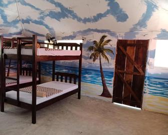 Soul Breeze Beach Resort - Diani Beach - Ložnice