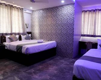 Wishotel Inn The Silver Sky - Indore - Bedroom