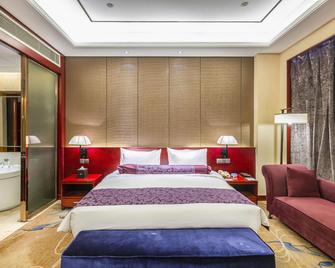 Xuchang Shenghe Lijing Hotel - Xuchang - Bedroom