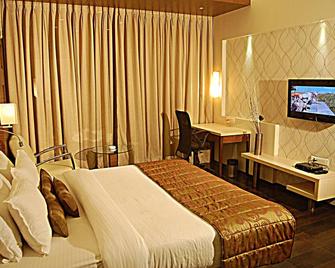 Sentosa Resorts and Water Park - Pune - Bedroom