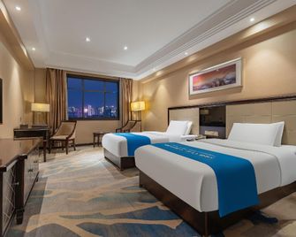 Kaisheng Meiji Hotel (Yichang Cbd Shopping Center) - Yichang - Schlafzimmer