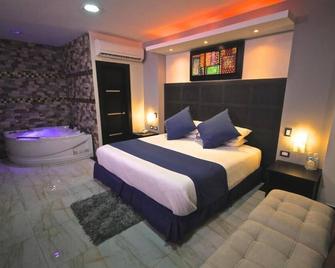 Hotel Golden Vista - Santo Domingo de los Colorados - Camera da letto