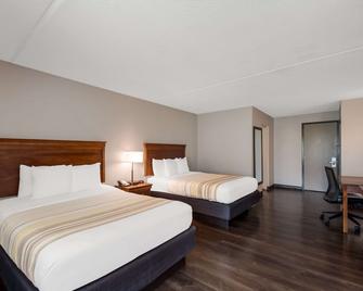 Country Inn & Suites by Radisson, Fredericksburg S - פרדריקסברג - חדר שינה