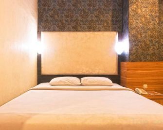 Hotel New Star - Yakarta - Habitación
