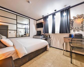 Gongju Khai Hotel - Gongju - Habitación