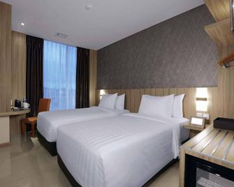 Aston Nagoya City Hotel - Batam - Bedroom