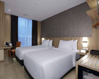 Aston Nagoya City Hotel - באטאם קוטה - חדר שינה